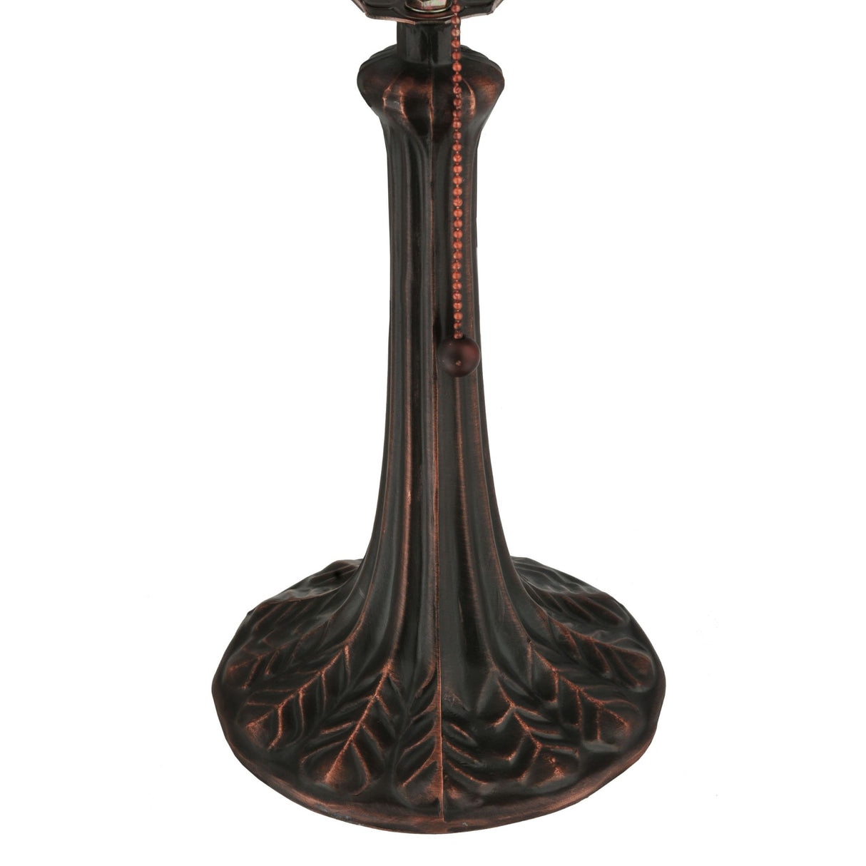 An antique bronze lamp base with intricate leaf patterns and a pull chain.