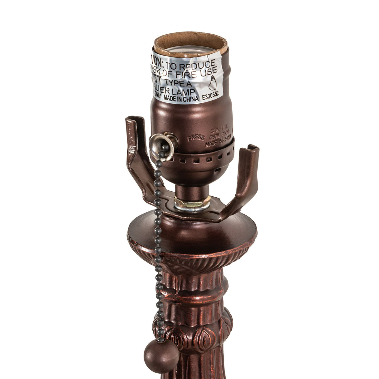 Closeup of a lamp socket featuring a chain attached to the lamp.