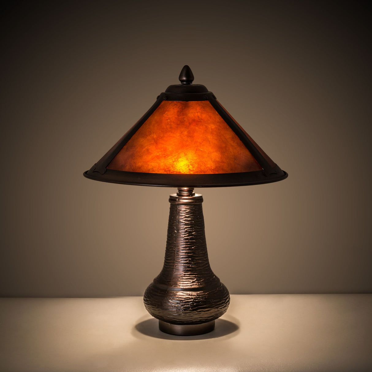 Illuminated view of the 14" High Sutter Accent Lamp highlighting warm amber glow.