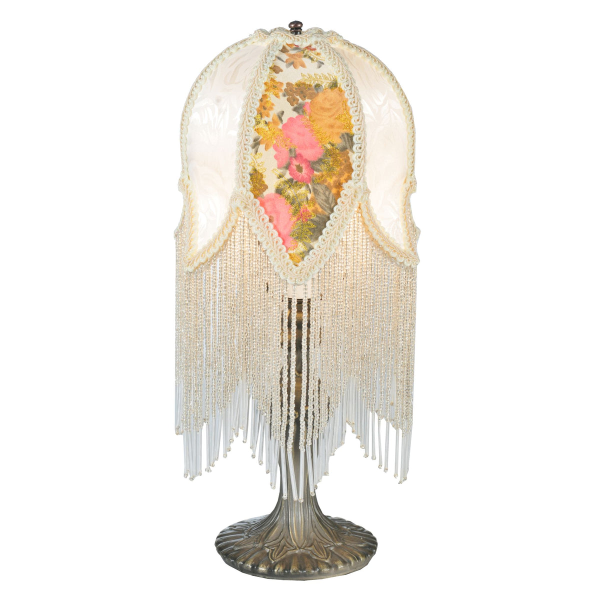 An 15"H Fabric & Fringe Victorian Tulip Accent Lamp featuring a floral design and fringe detailing.