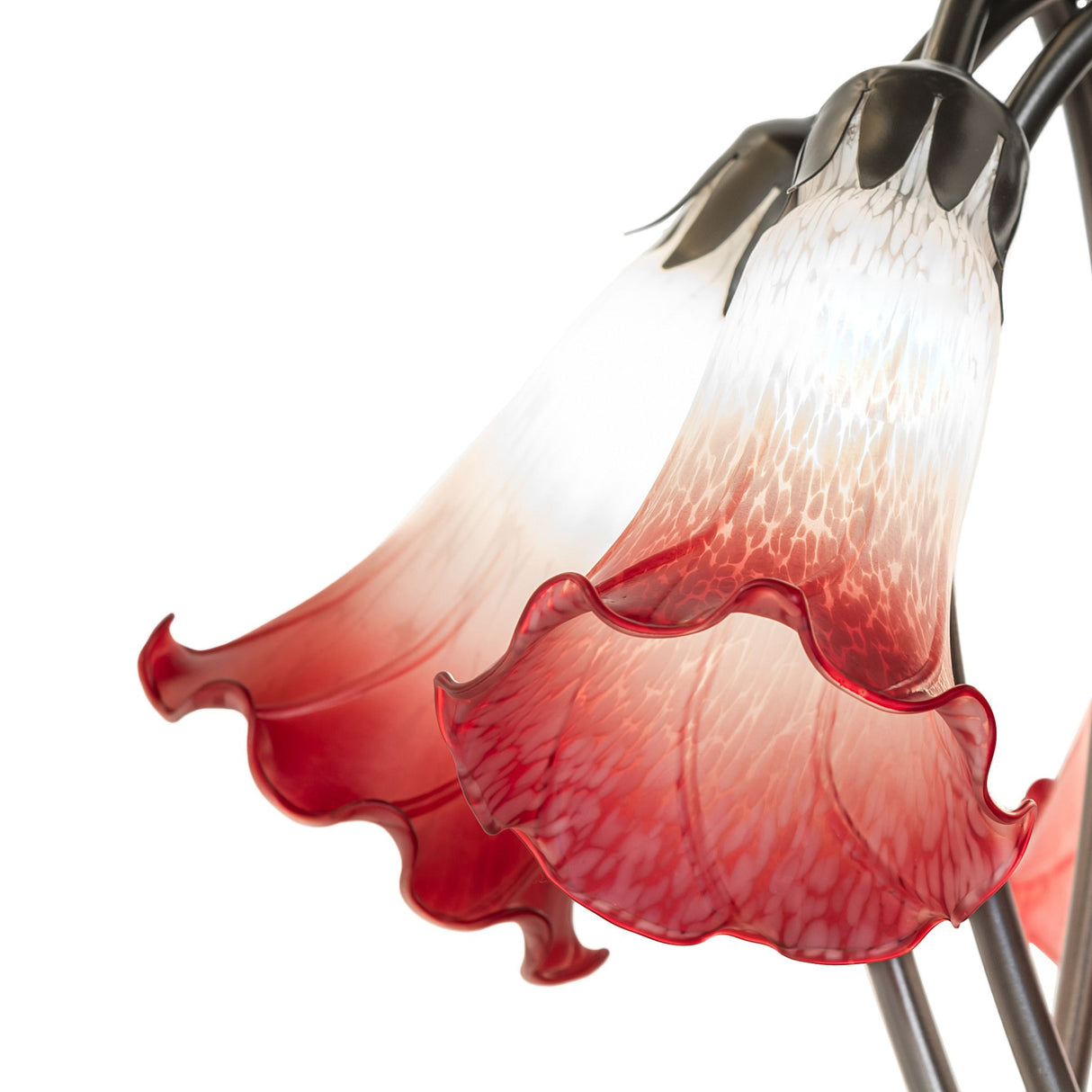 Detailed design of Pink and white glass shades on tiffany lamp.