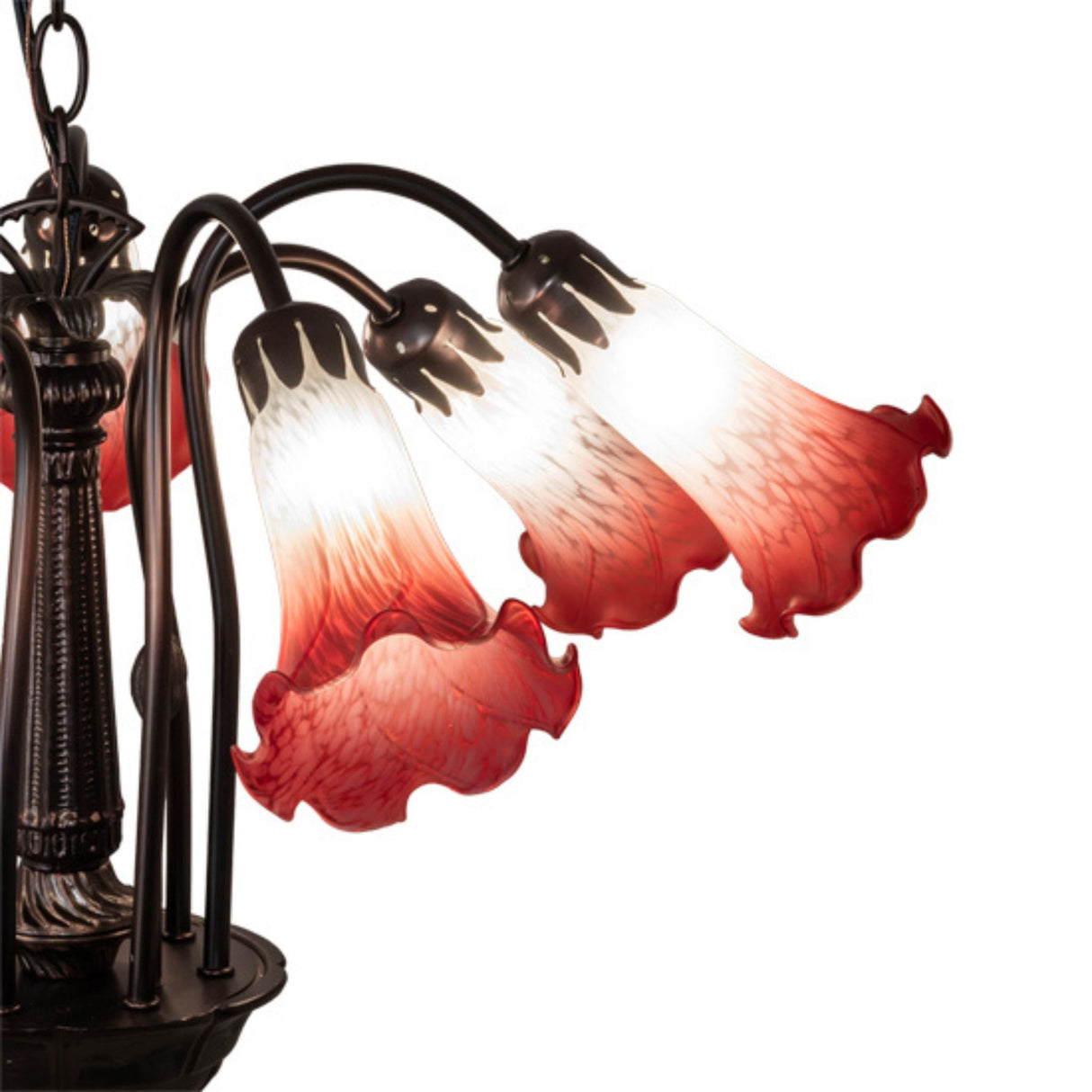 Close-up of red and white frosted lily-shaped glass shades on Tiffany Pond Lily chandelier.