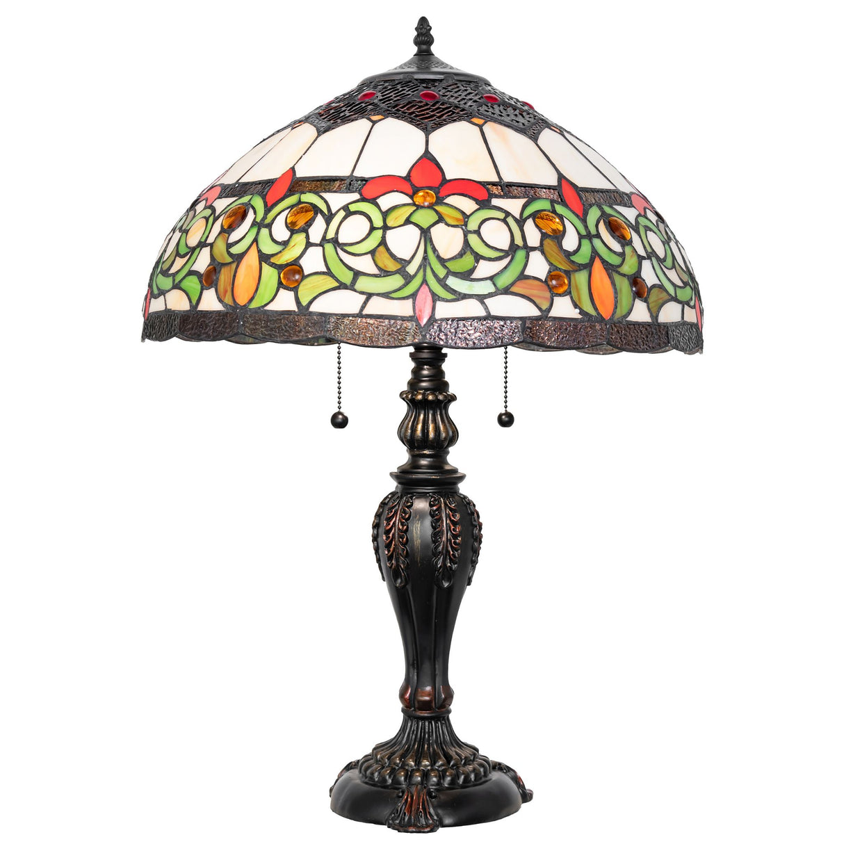 Creole table lamp illuminated, creating a warm ambiance with its stained glass shade.