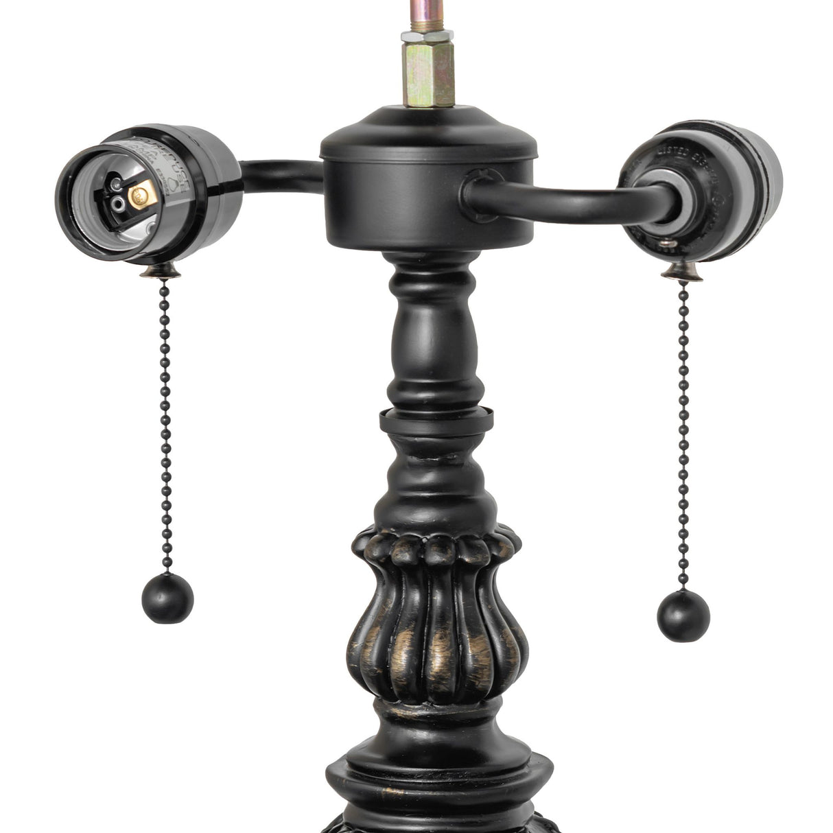 Close-up view of lamp base showcasing detailed design and chain pulls.