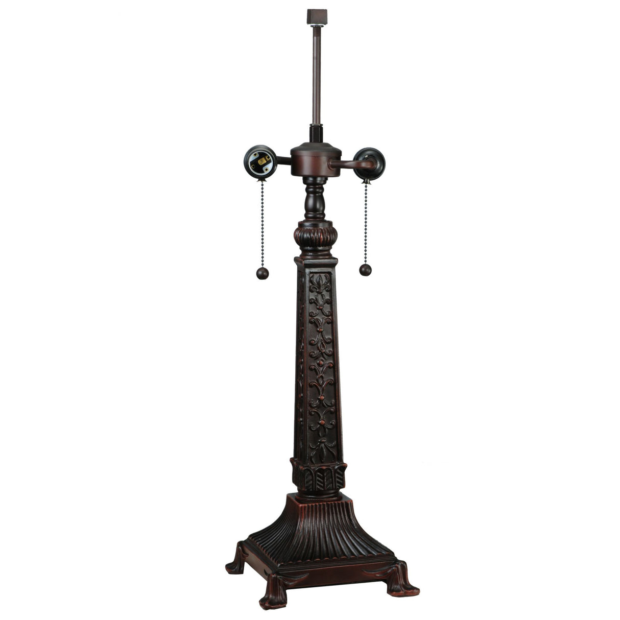 Base of Mission Rose table lamp showcasing intricate carvings.