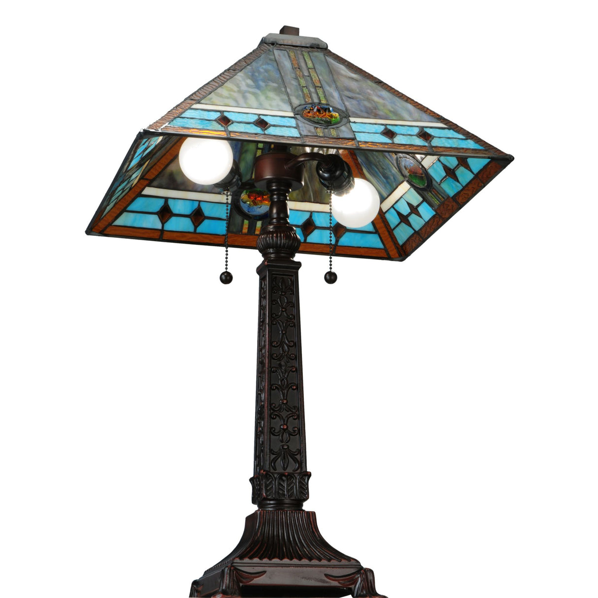 Stained glass shade lit up on Mission Rose table lamp for a vibrant display.