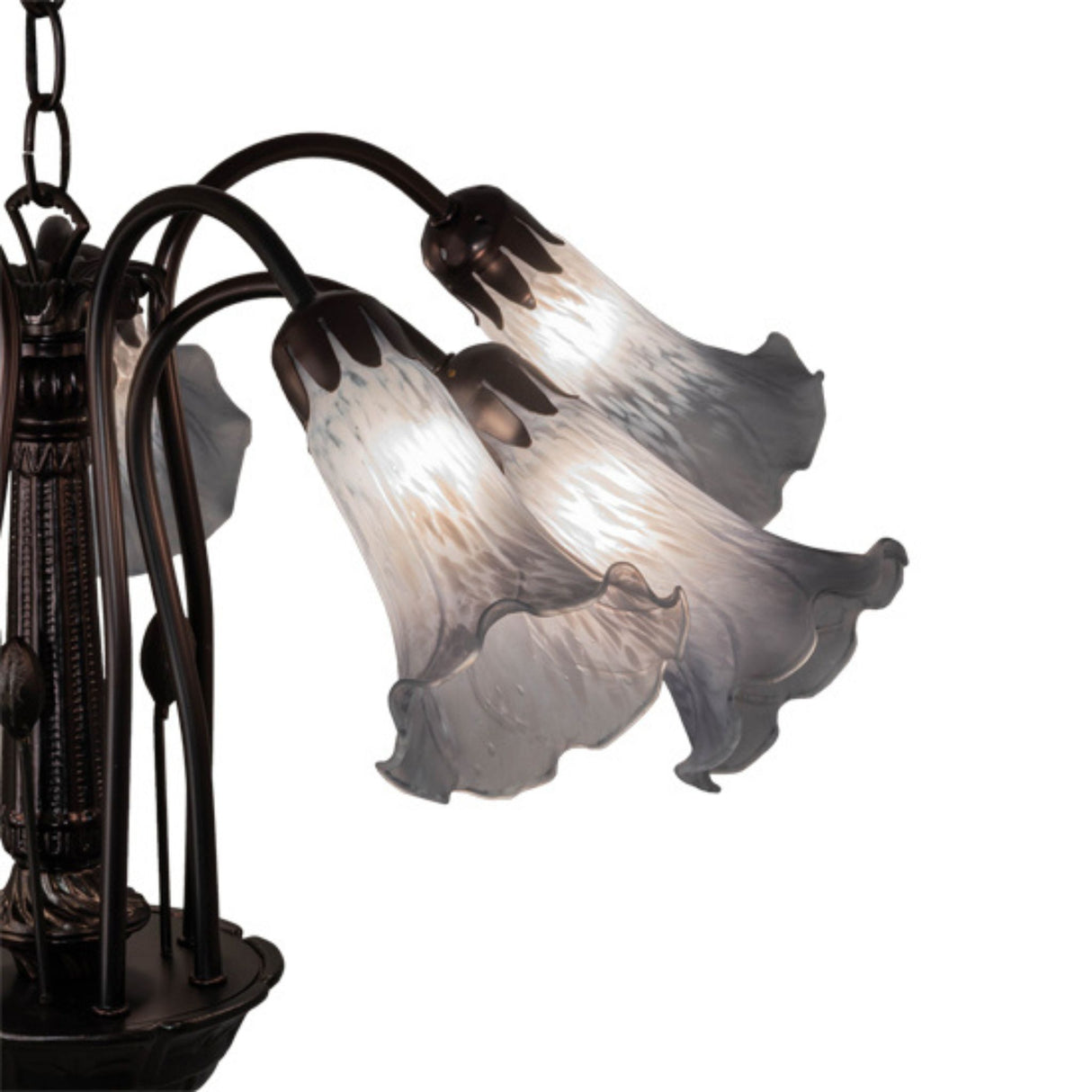 Close-up of frosted lily-shaped glass shades on Tiffany Pond Lily chandelier.