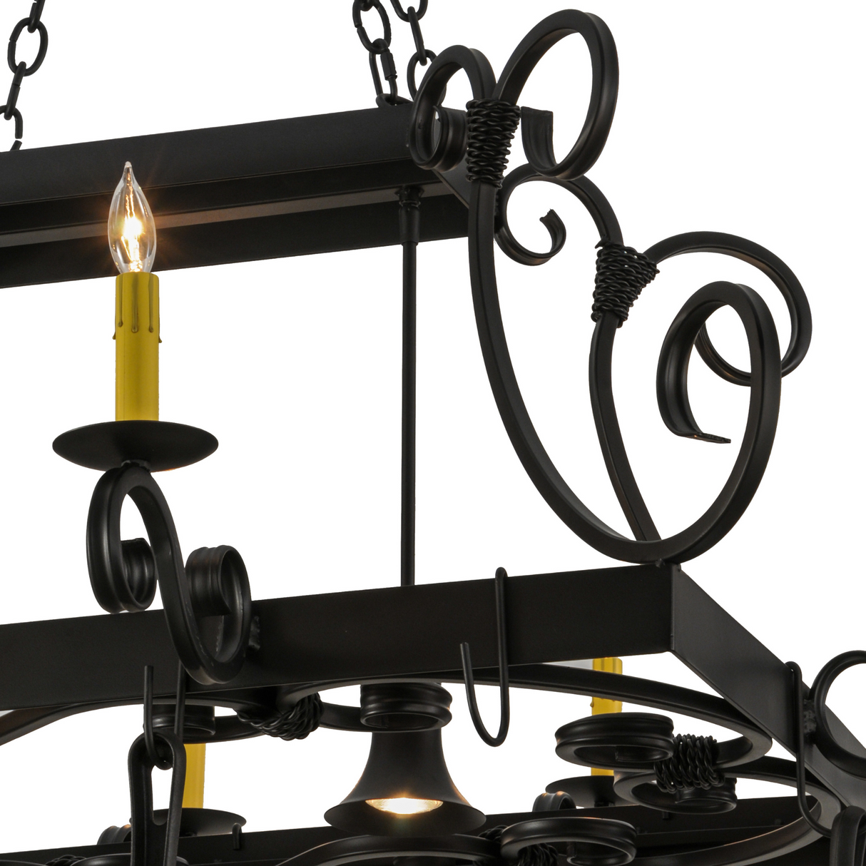 Close-up of scrollwork and candlelight detail on Caiden rack.