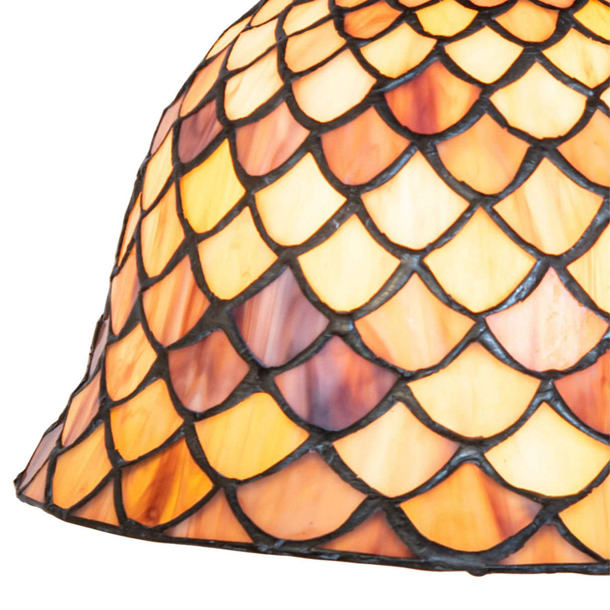 detailed view of fishscale glass design on flushmount light.