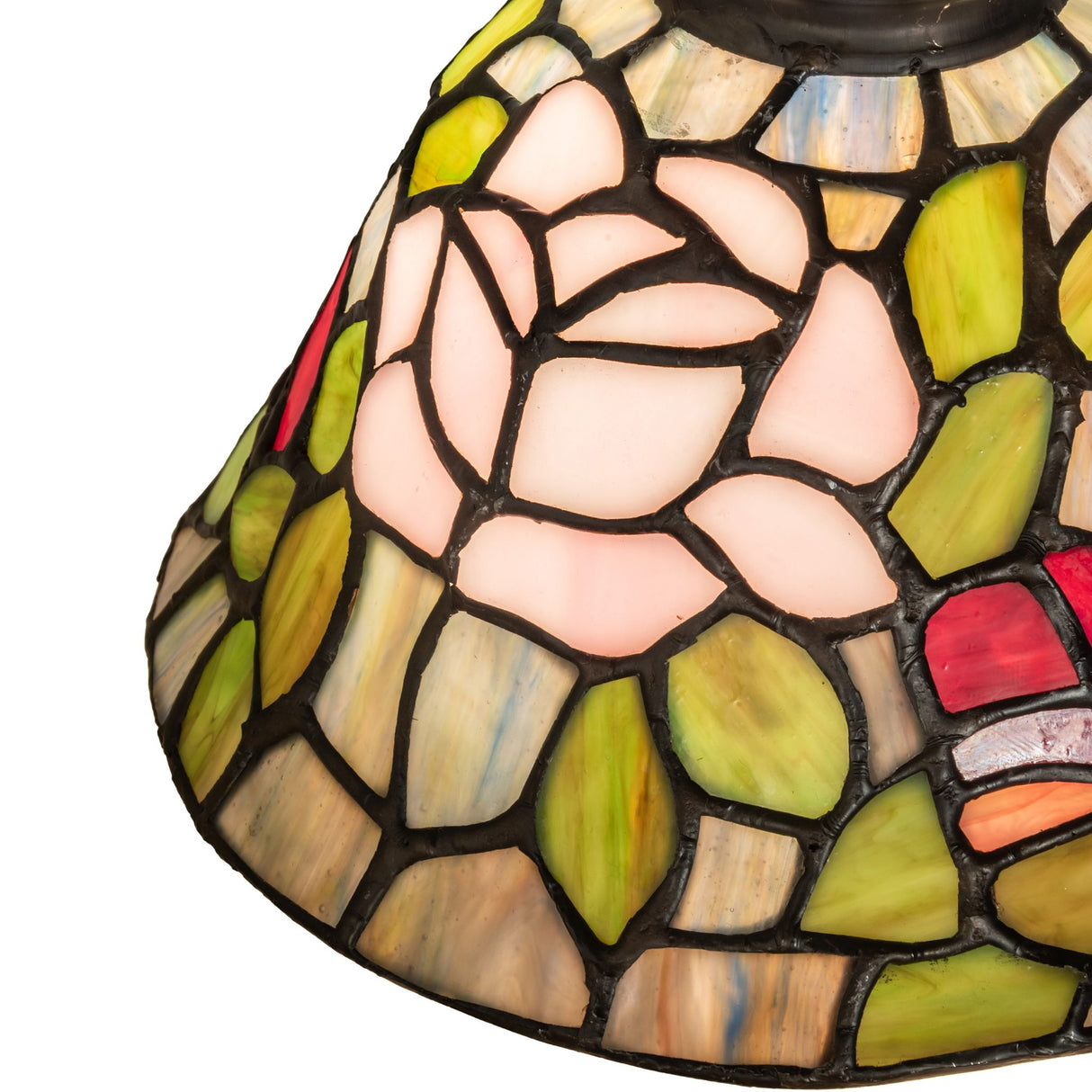 Closeup of an 8" Tiffany lamp with a pink rose design.