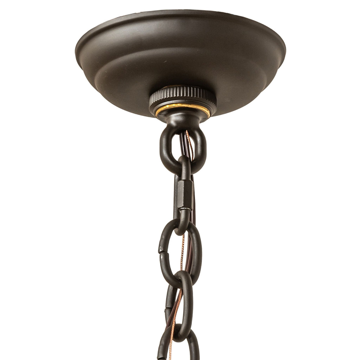 Closeup of chandelier canopy and hanging chain in oil rubbed bronze finish.
