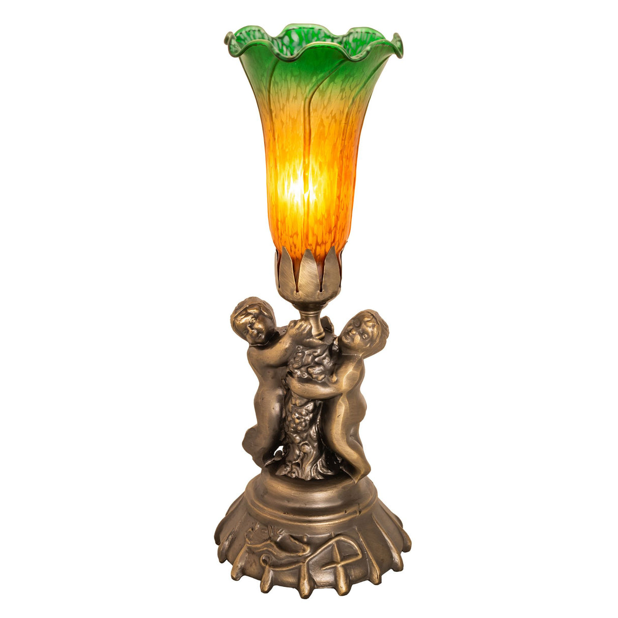 Amber and green pond lily lamp glowing with warm illumination.