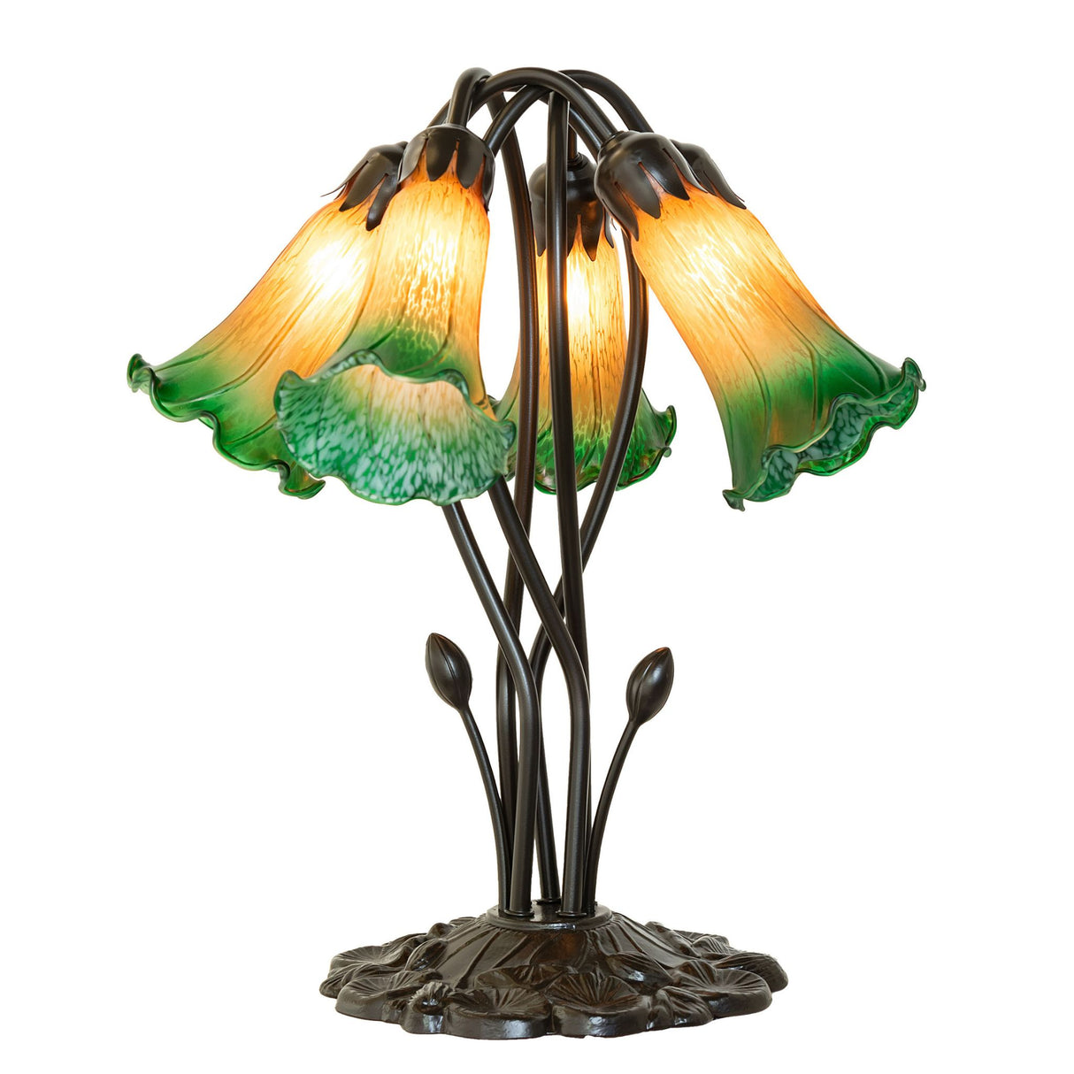 Close-up of vibrant amber and green glass petals on the tiffany lamp.