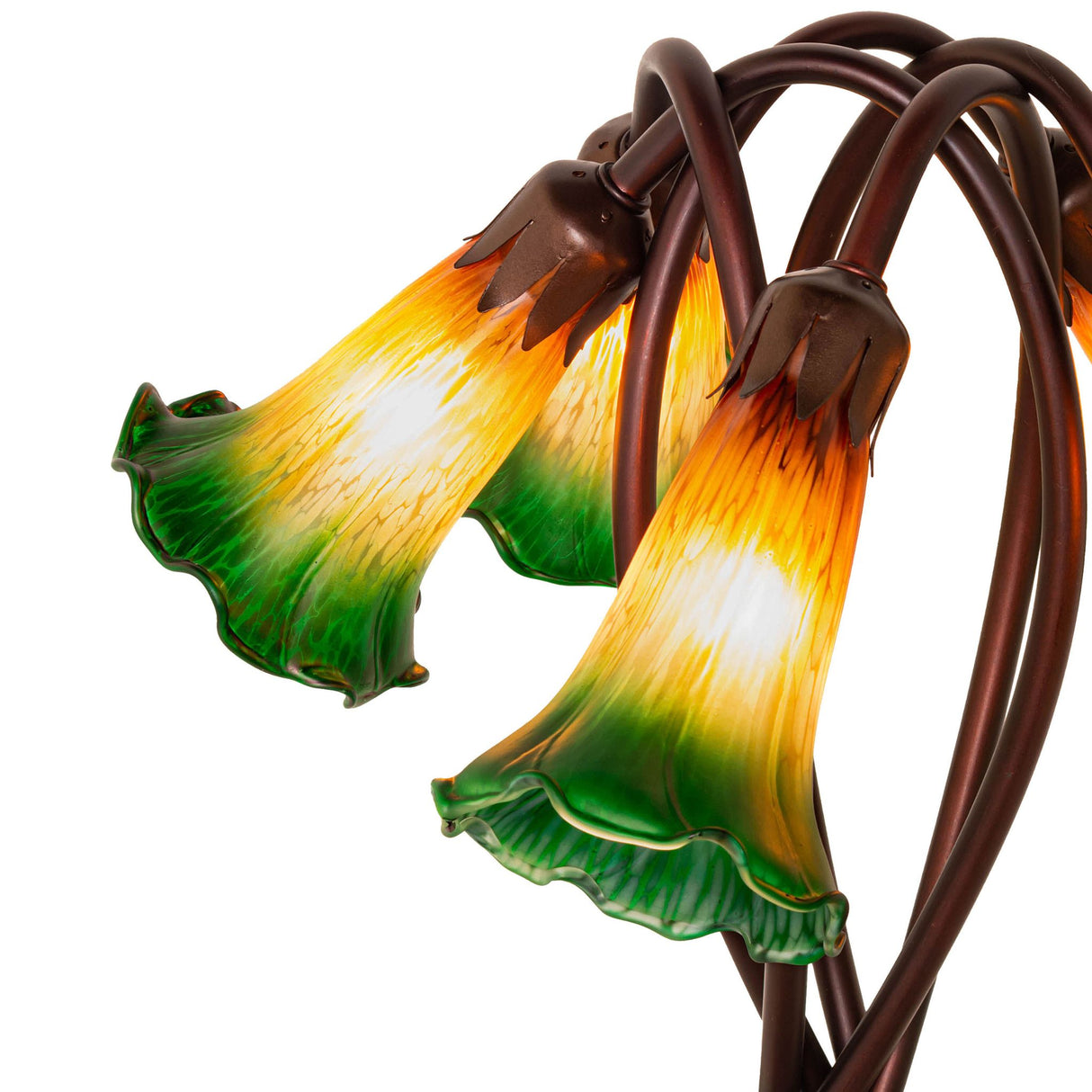 Close-up of the amber and green glass flower shades of the Tiffany lamp.
