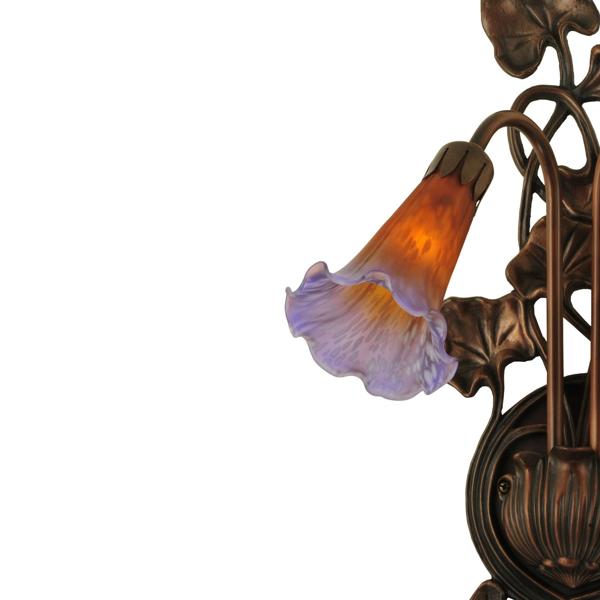Close-up of glowing floral-shaped Amber and Purple Pond Lily glass shade on bronze wall sconce.