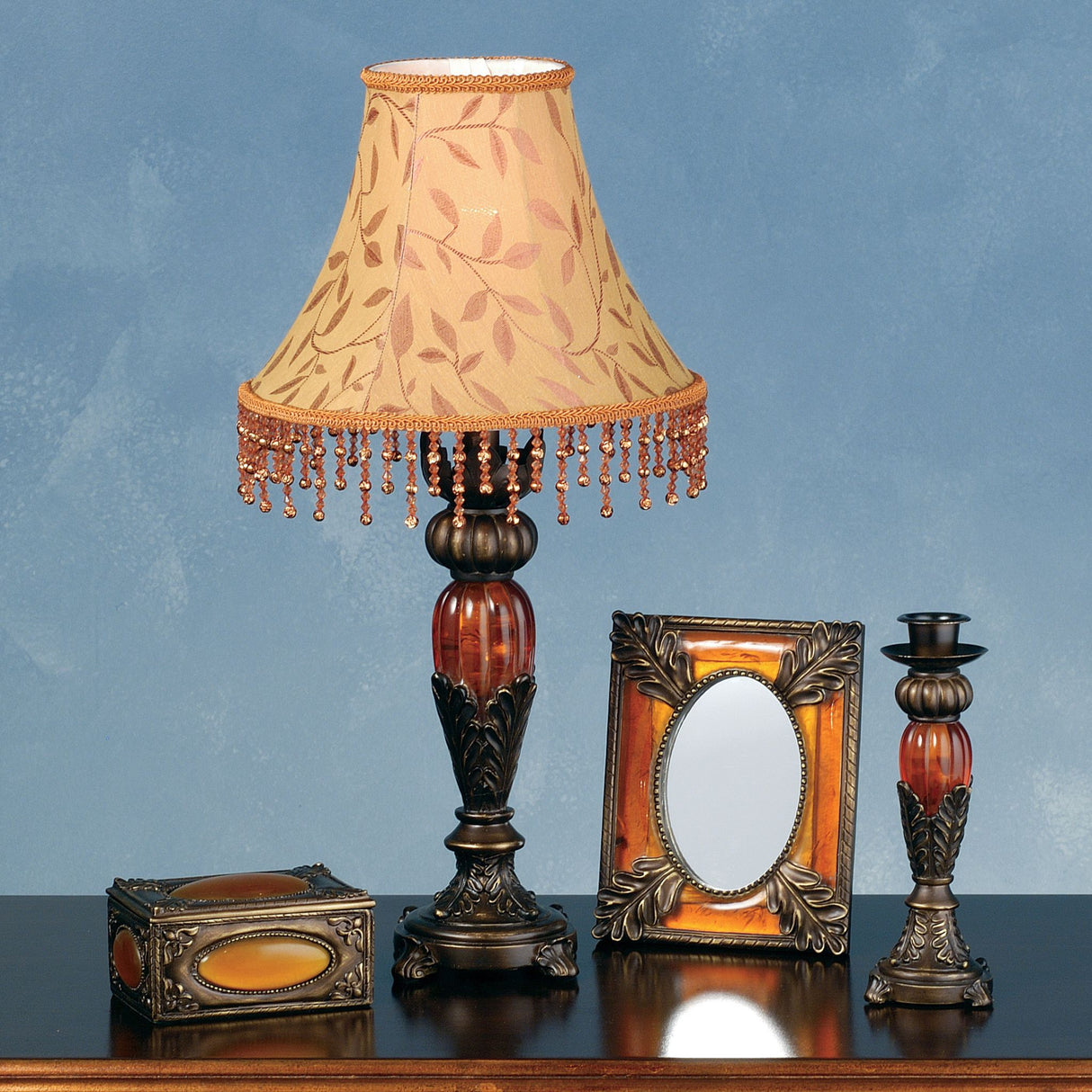 Amherst 4-piece vanity set featuring a lamp, jewelry box, candlestick, and frame.