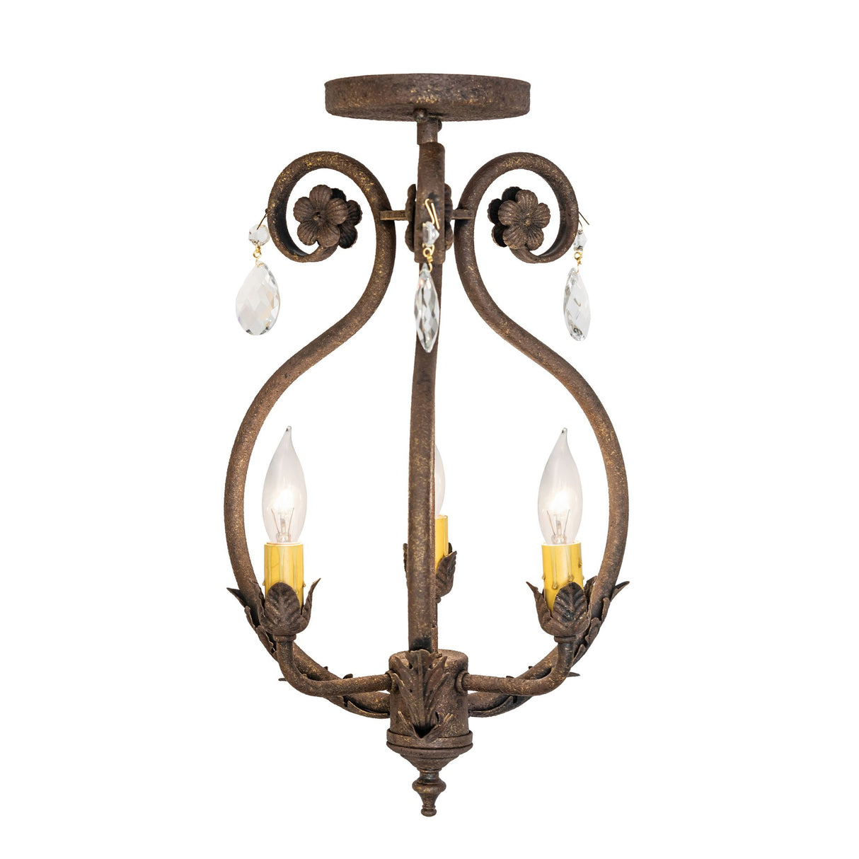 Side view of chandelier highlighting curved arms, leaf detailing, and hanging crystal drops.
