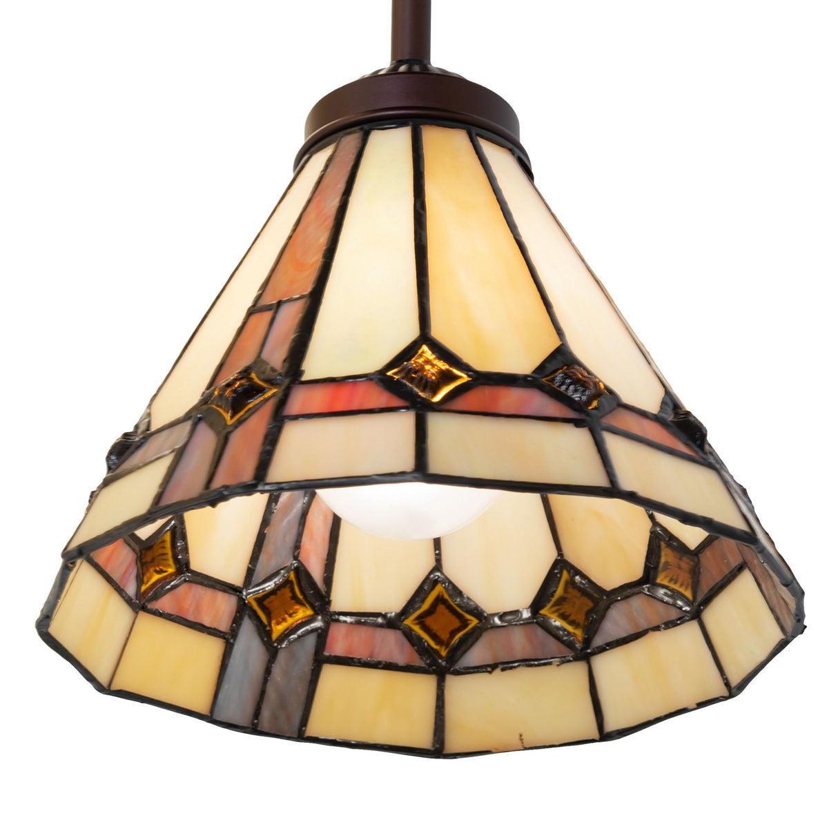Belvidere Mini Pendant lit up to reveal its warm and inviting glass tones.