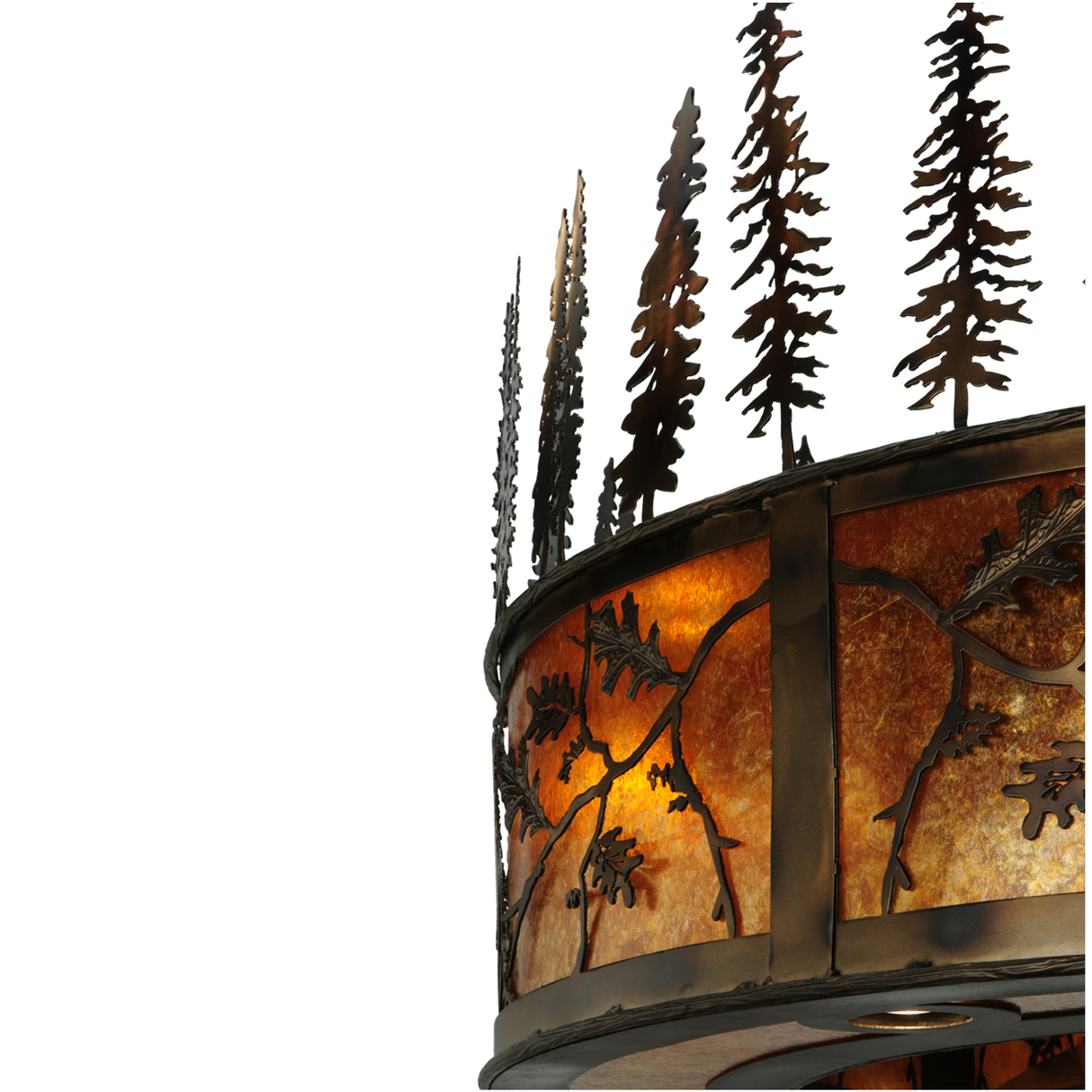 Detailed view of pine tree cutouts and warm amber glow.
