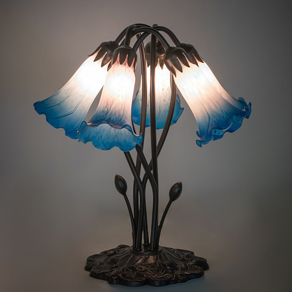 Artistic shot of the illuminated lily table lamp.