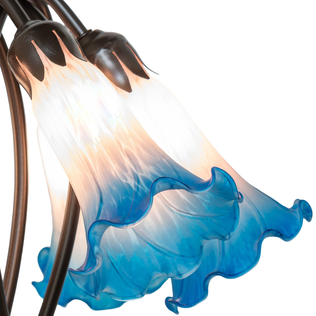 Illuminated Tiffany lamp with vibrant blue and pink shades.