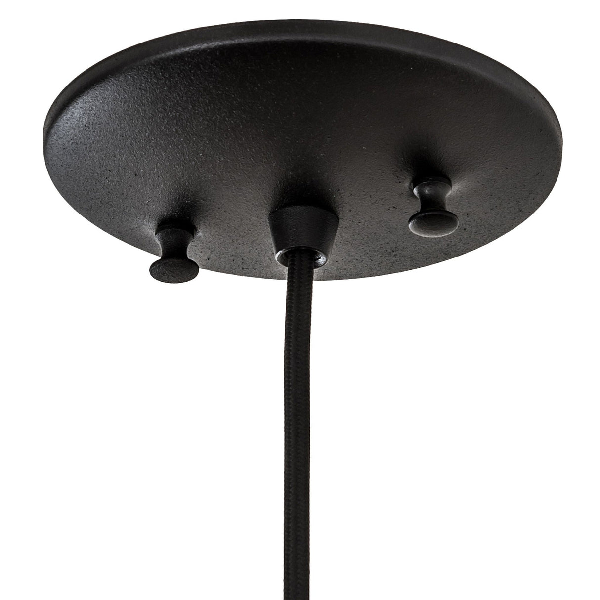 Close-up of the pendant's textured black hardware and cord.