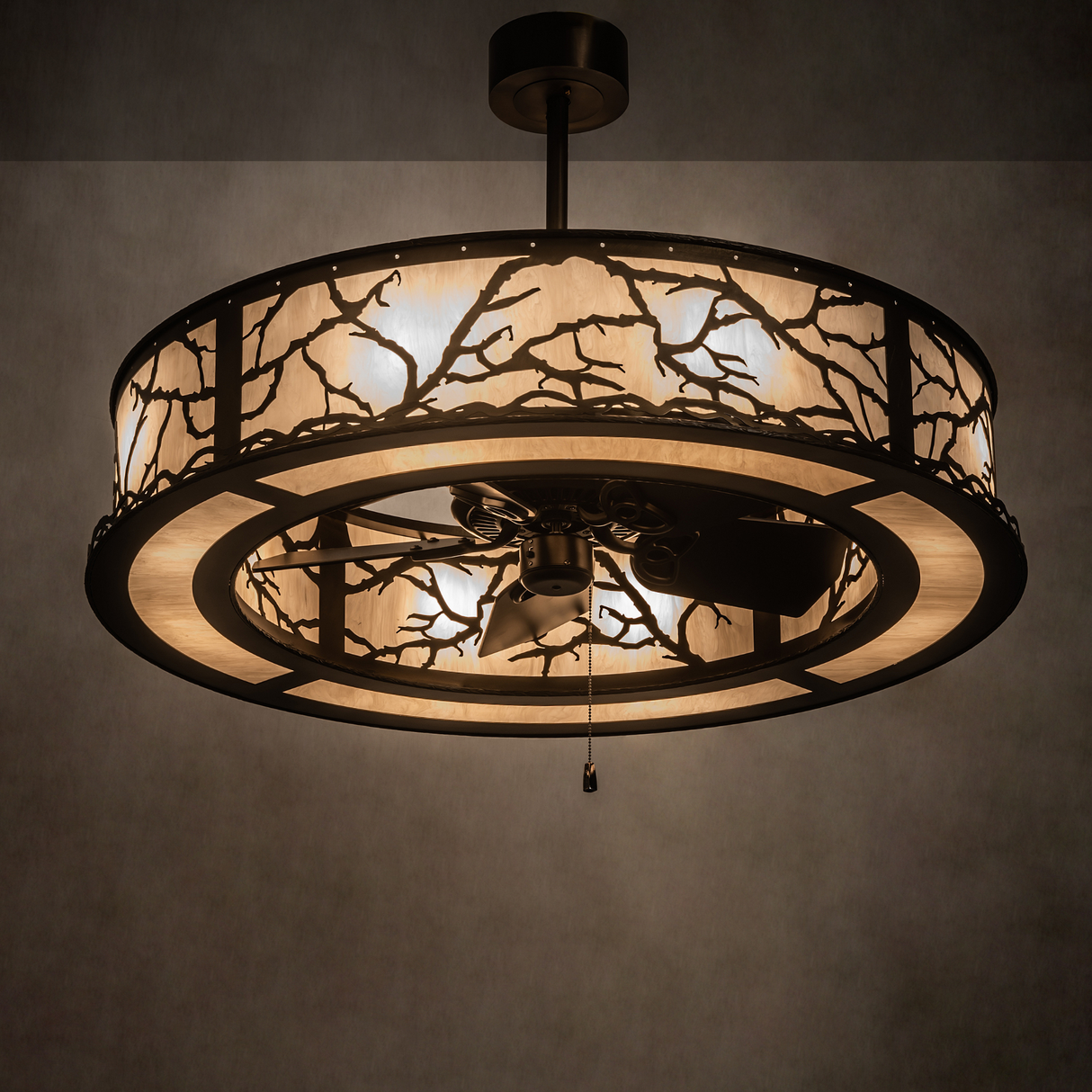 Branches Chandel-Air illuminated in room setting with cozy ambient lighting.