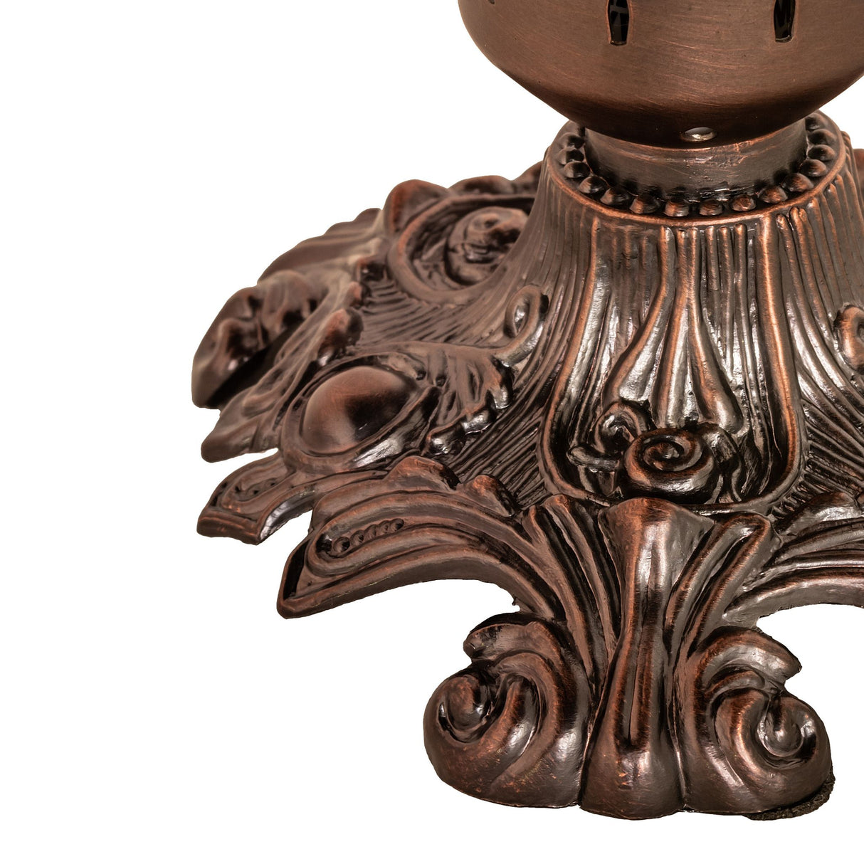 Close-up of the ornate bronze base of the pond lily lamp.