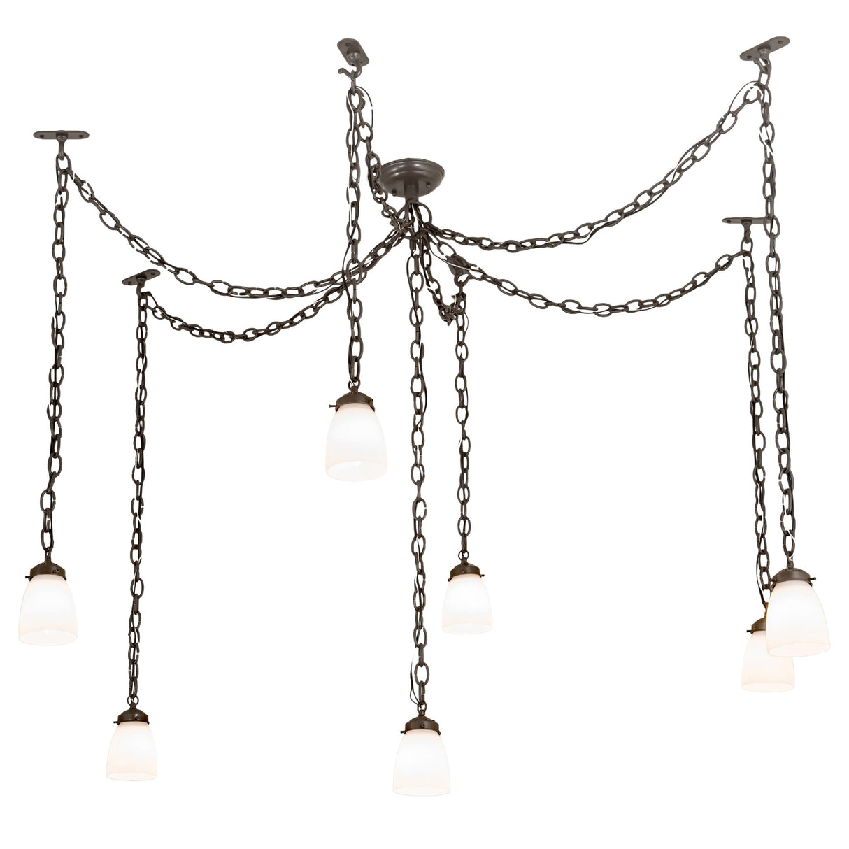 Wide view of the Castilian 7-light adjustable pendant with bronze chains and opalescent glass shades.
