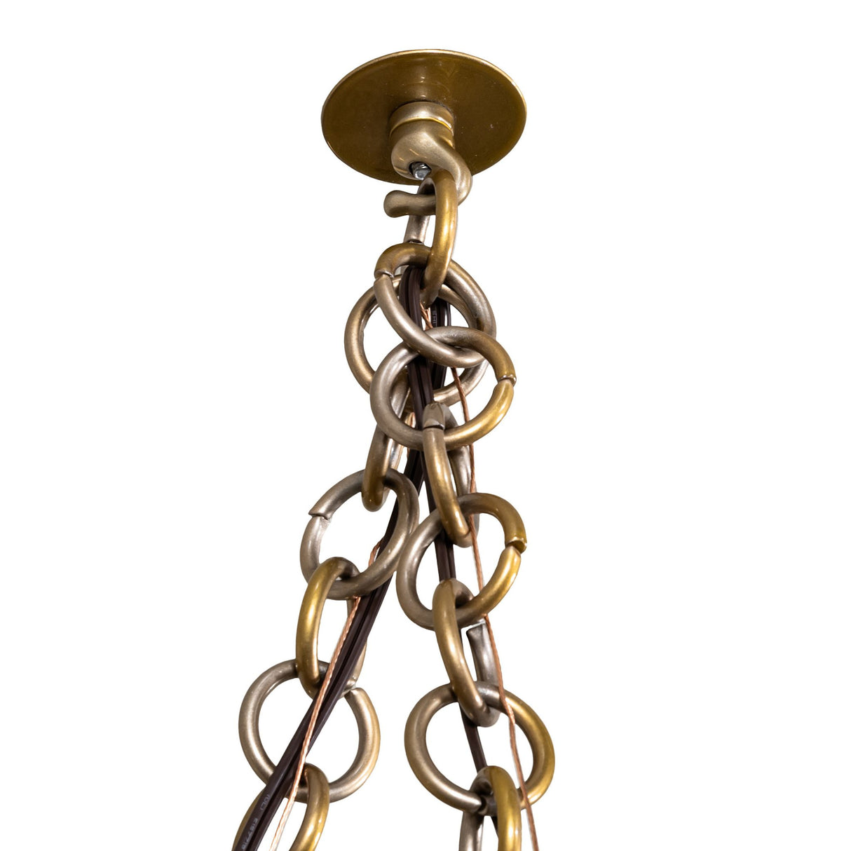 Detailed view of adjustable brass chain suspension on Castiliolite Bola chandelier.
