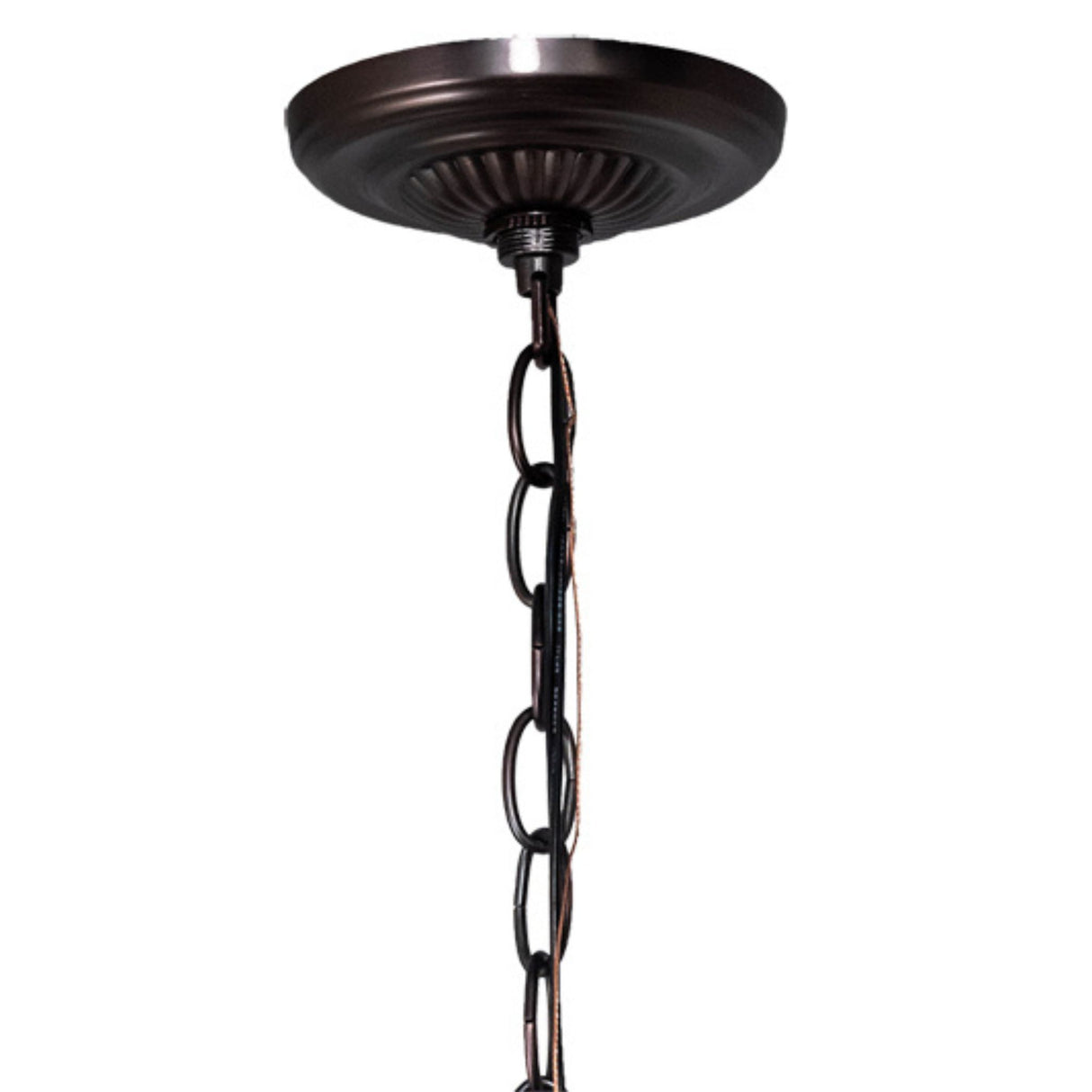 Close-up of the ceiling canopy and chain for a bronze chandelier.