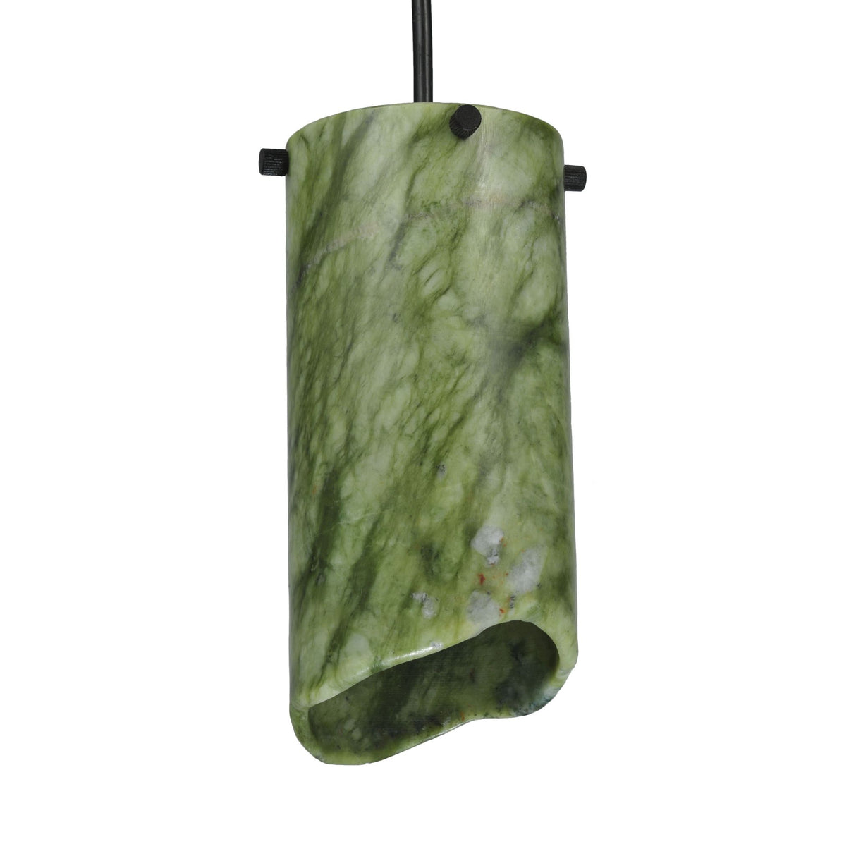 Diffused light from the Cilindro Jadestone Mini Pendant, illustrating a warm glow.