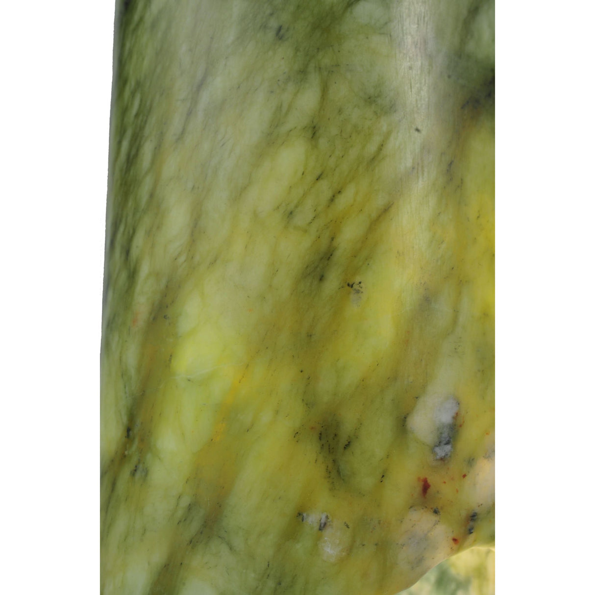 Texture detail of Cilindro Jadestone Mini Pendant showcasing green and yellow hues.