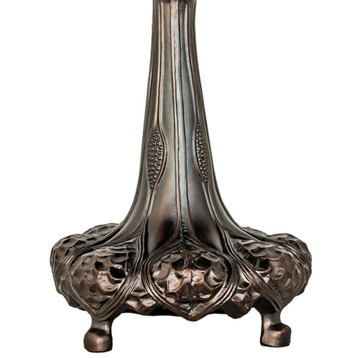 Close-up of the sculpted floral design at the base of a bronze lamp.