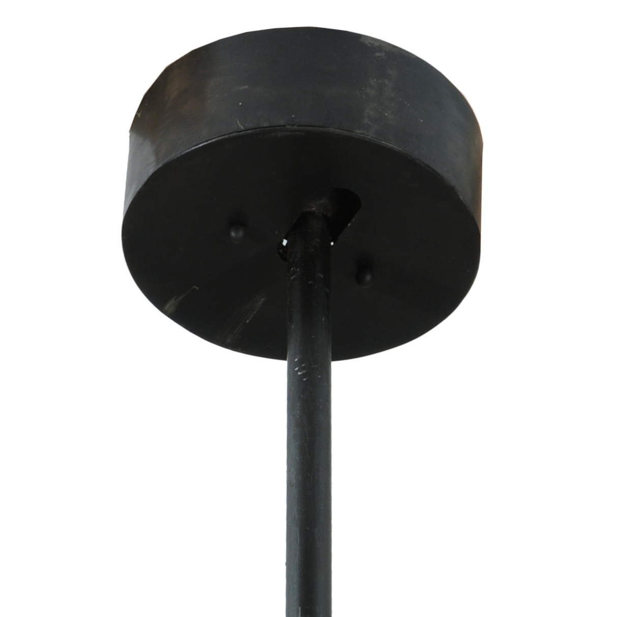 Ceiling canopy detail in blackened finish.