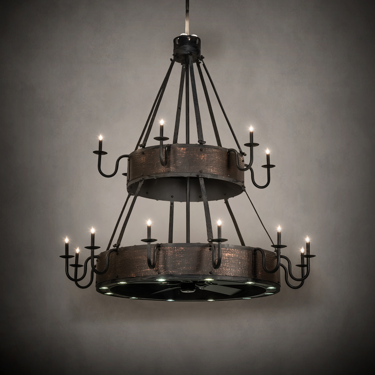 Ambient room view showing chandelier glowing warmly in rustic setting.