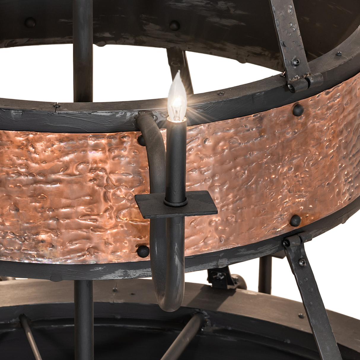 Close-up of candlelight arm with hammered copper finish.