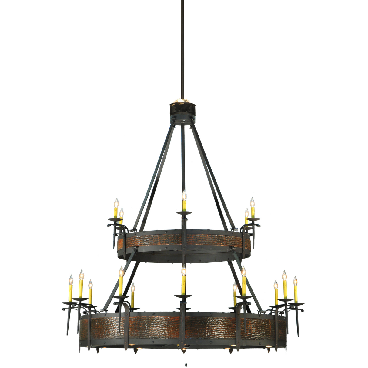 Focused view on tier edge showing metal texture and candlelight detail.