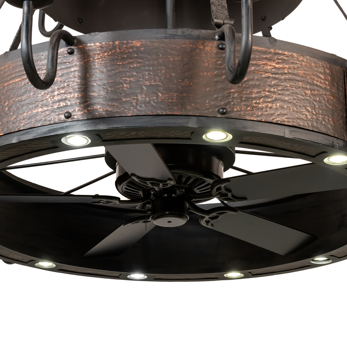 Close-up of fan blades and LED downlights below the lower tier.