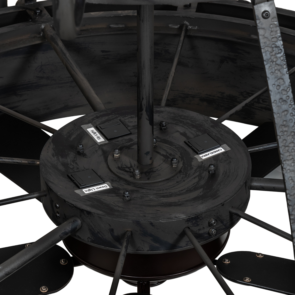 Close-up underside showing fan motor housing and control labels.