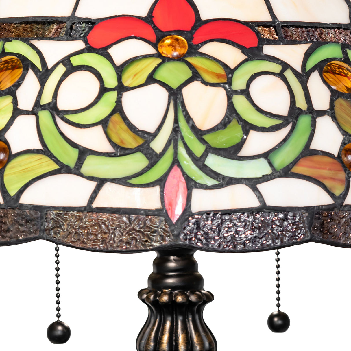 Detailed stained glass design with red, green, and amber accents.