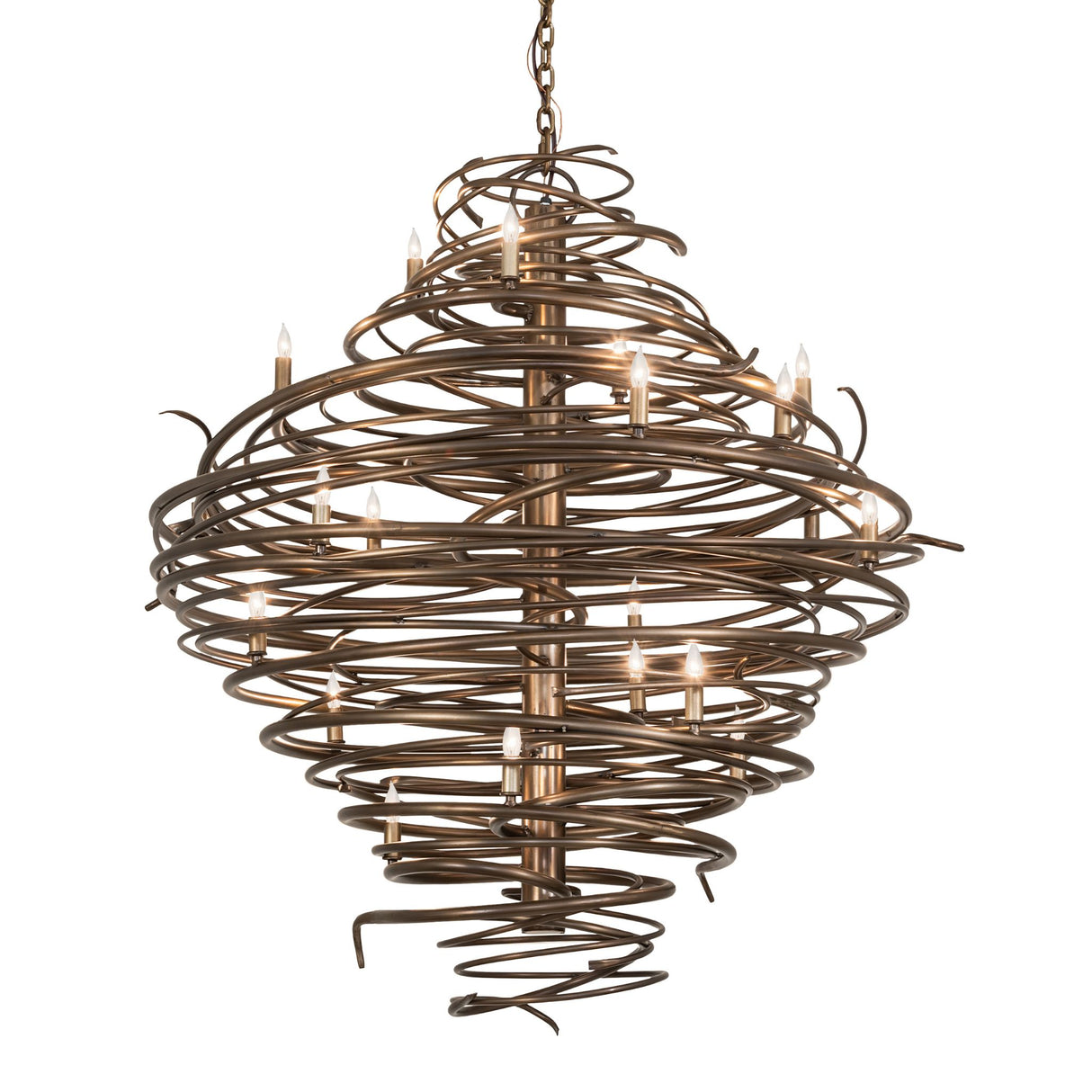 Cyclone chandelier illuminated, featuring swirling antique copper iron bands with candle-style bulbs.