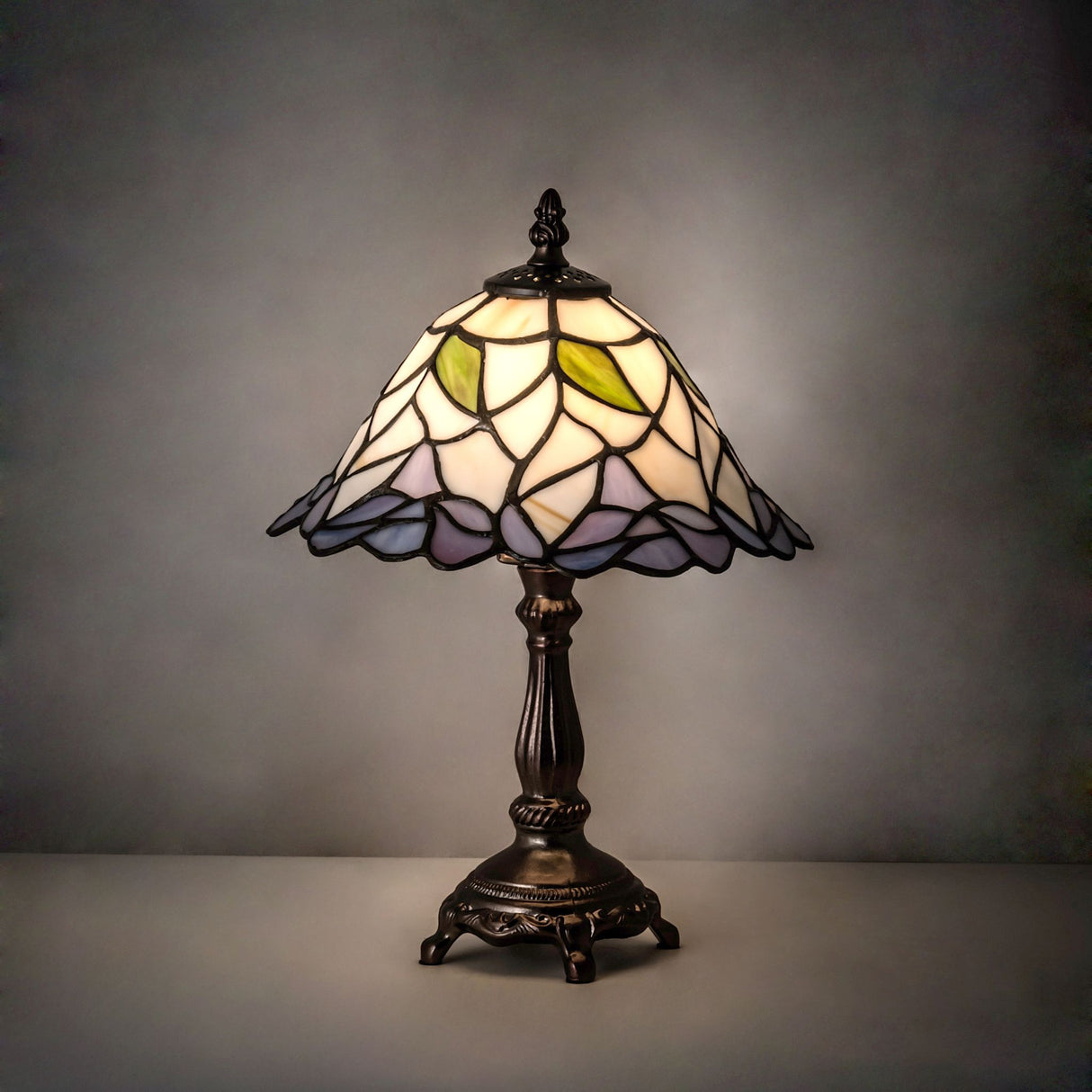 Illuminated Daffodil Table Lamp creating a warm ambient glow with vibrant colors.