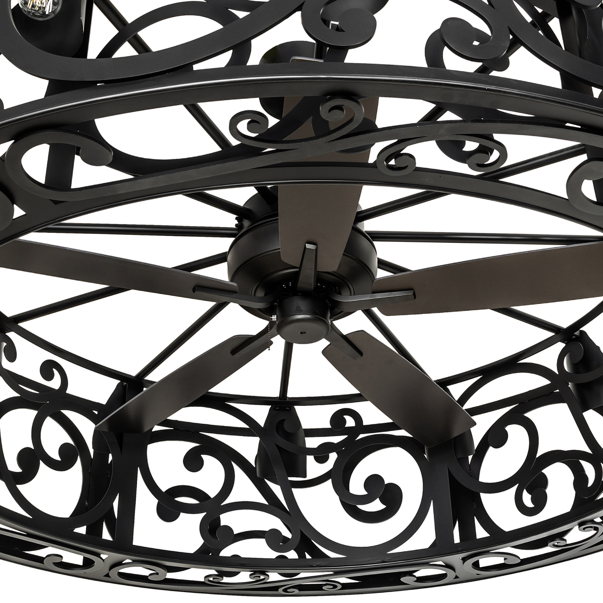 Close-up of Dean chandelier fan motor and decorative scroll detailing.