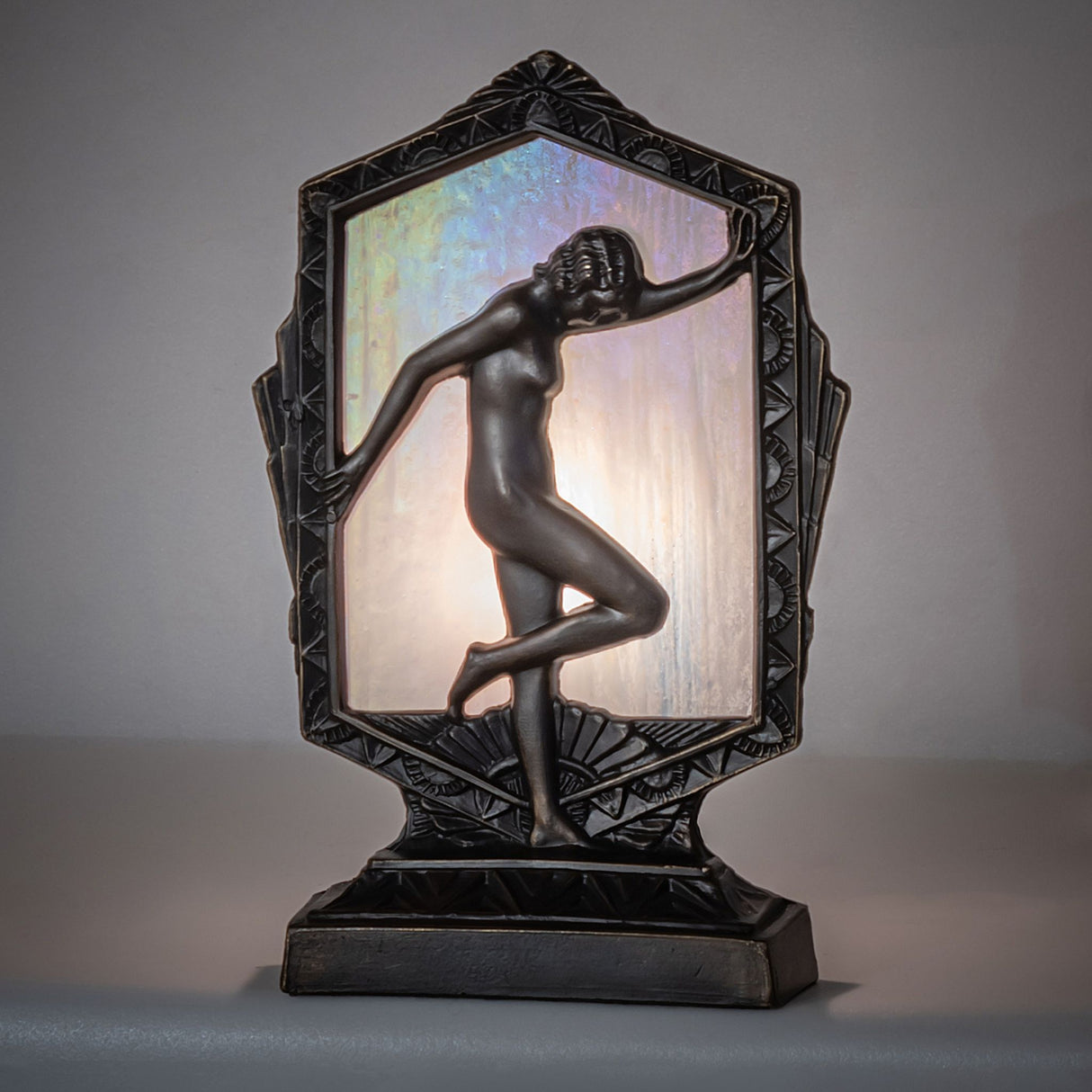 Ambient view of the Deco Posing Lady Accent Lamp with soft illumination.