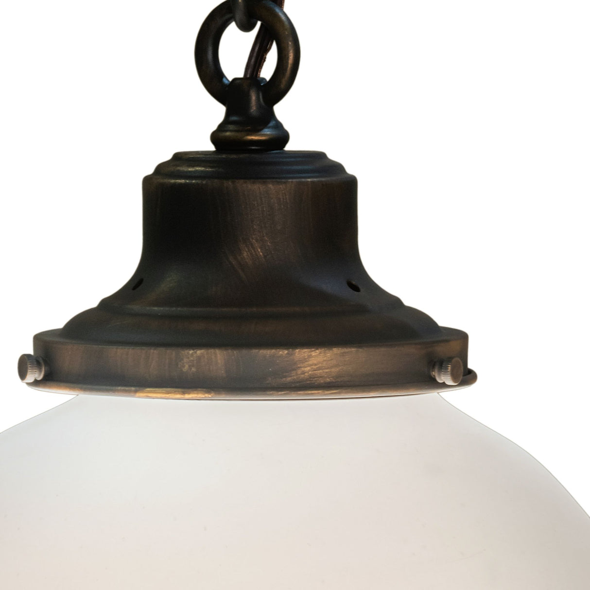 Detailed look at Ovum Aquinum pendant holder.