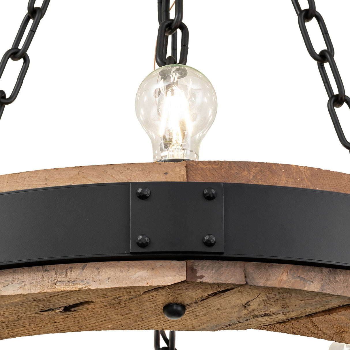 Close-up of black chain suspension and mounting hardware.