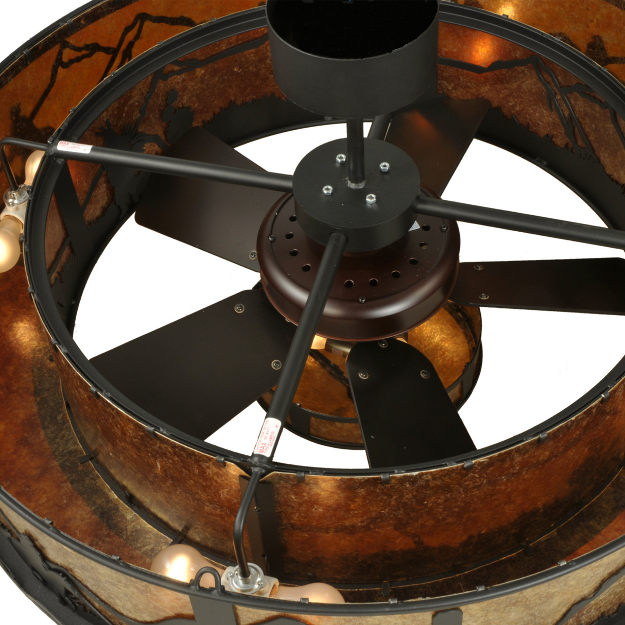 Interior view showing mounted light bulbs and dark bronze fan frame.