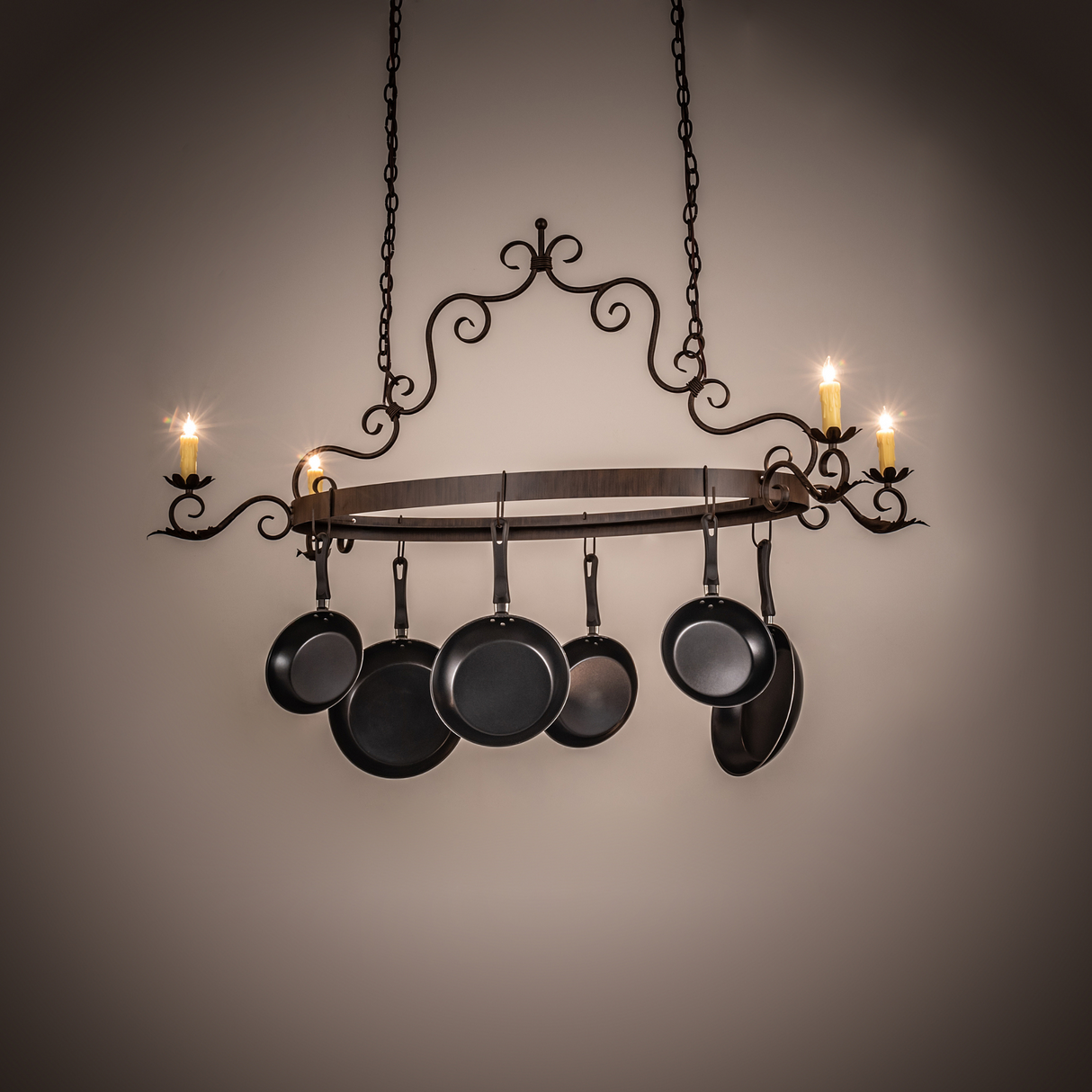 Elara 4-light pot rack chandelier lit, ambient room view.