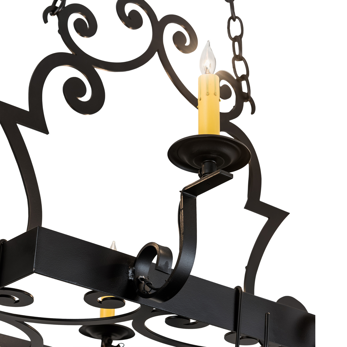 Close-up of candlelight and scroll detailing on Elara chandelier.